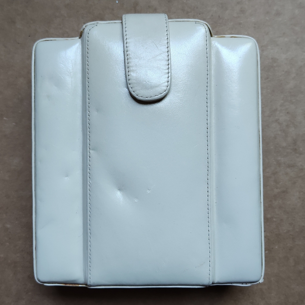 Cream colored clutch For Bolan Too
